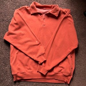 Brandy Melville Archer Sweatshirt in the color burnt orange